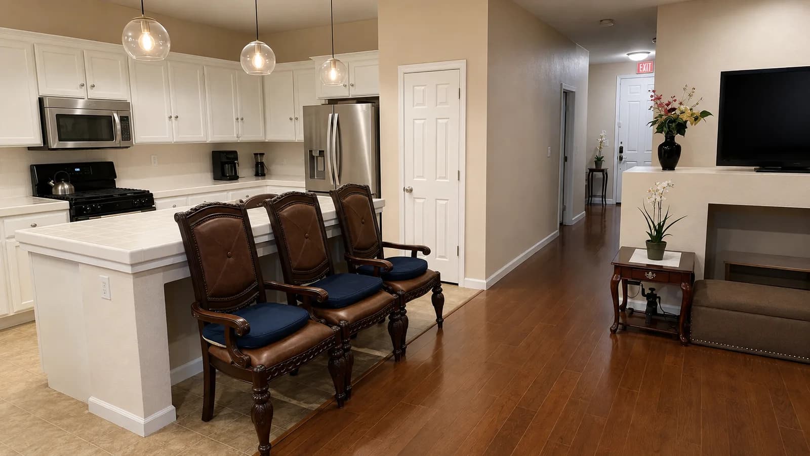 Kitchen at Joy in Caring I with a central island and seating